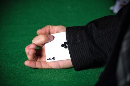 Man with ace up his sleeve.